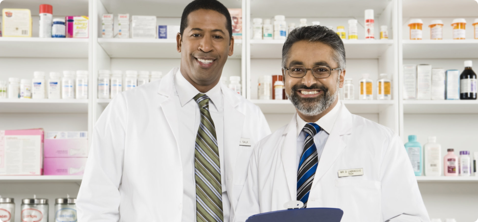 Two pharmacist smiling